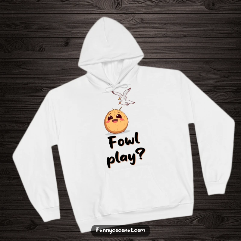 Funny hoodie featuring a laughing coconut with comically large eyes observing a seagull in hilarious disbelief or amusement.