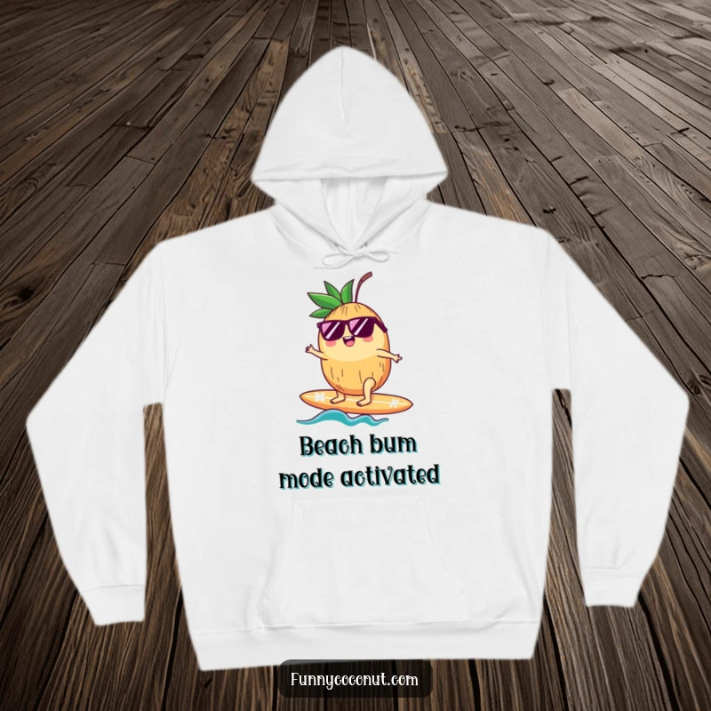 Funny hoodie depicting a relaxed coconut wearing sunglasses, masterfully surfing a surfboard with a happy, cool demeanor.