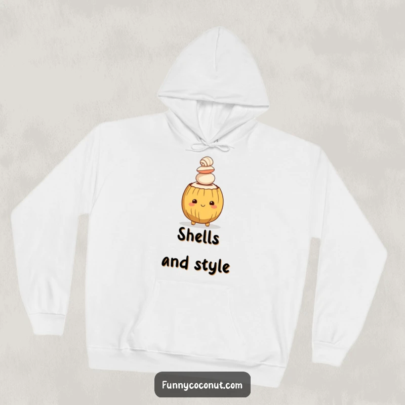 Funny hoodie adorned with a smiling coconut character expertly balancing a stack of seashells on its head, embodying tropical relaxation.