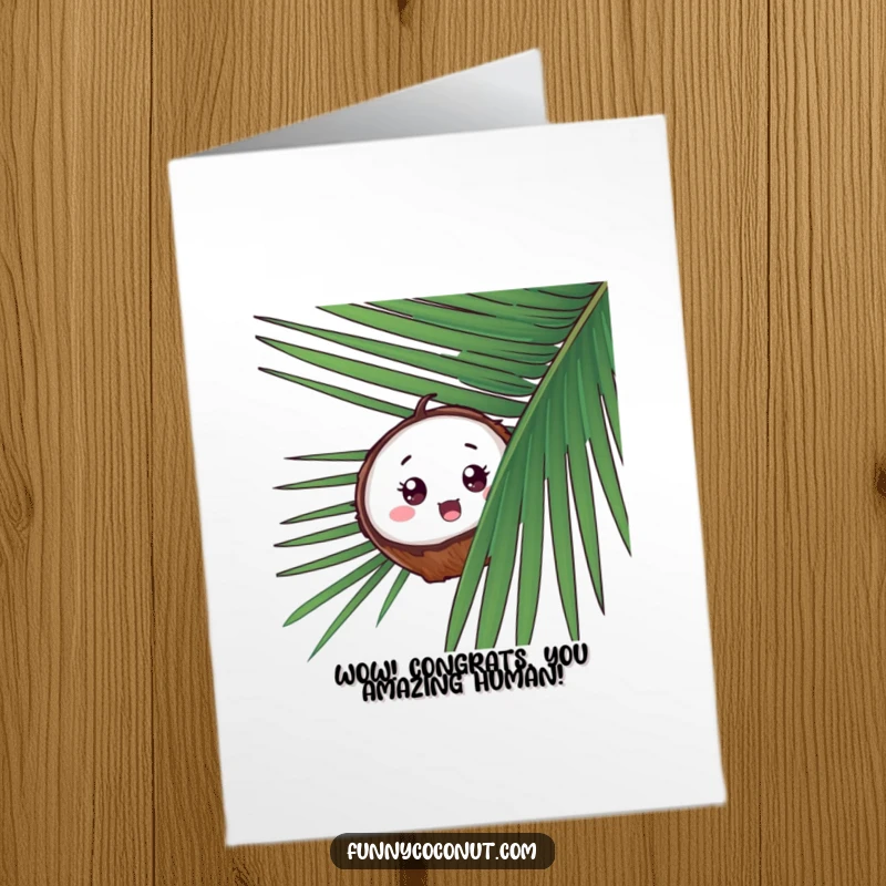 Free printable congratulations card: a coconut with a surprised face peeks from behind a large palm frond.